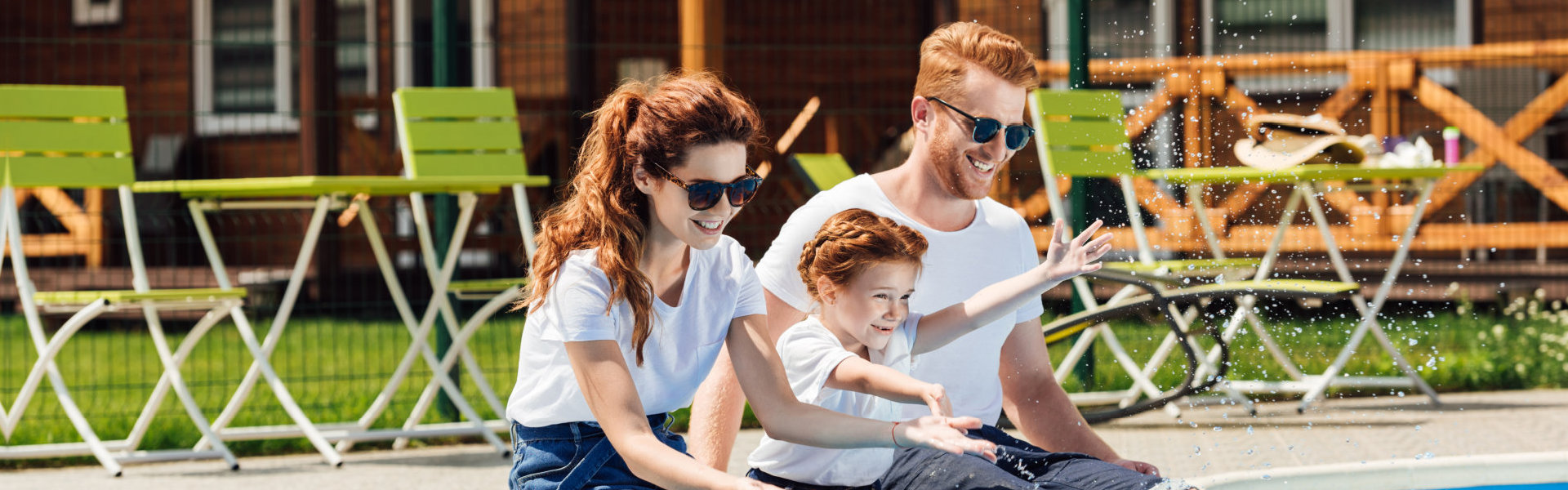 beautiful young family in white t-shirts